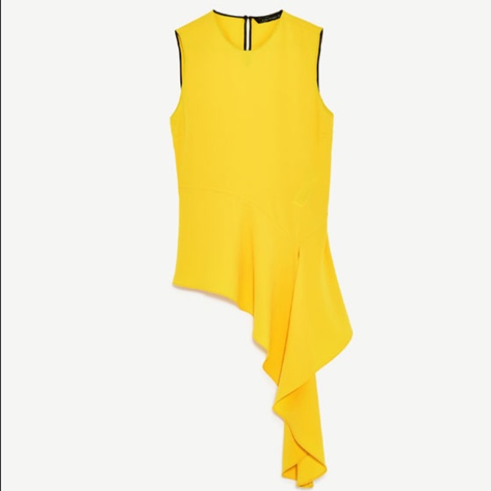 Bright yellow asymmetric peplum top